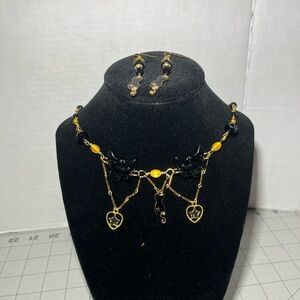 Elegant Black and Gold Cat Earrings and necklace set